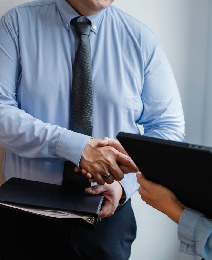 Entrepreneurs shaking hands after agreement